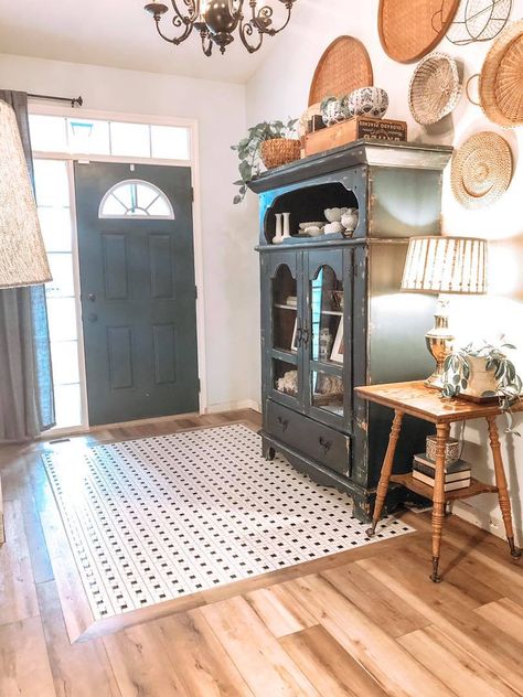 I am so glad we decided to add a tile rug when we were redoing our floors with luxury vinyl tile! It adds the perfect touch to the entryway! Rug In Entryway, Tile Inlay, Entryway Tile, Entryway Flooring, Luxury Vinyl Tile Flooring, Vinyl Tile Flooring, Tile Rug, Decor Baie, Flooring Projects