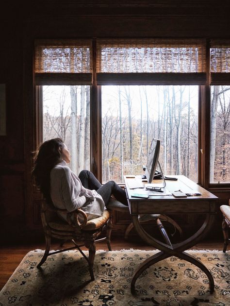 Cozy Aesthetic Office, Old House Office, Desk By The Window Aesthetic, Studying By The Window, Reading Book By Window, Work From Home Aesthetic, Community Manager Social Media, Forest View From Window, Cozy Studio Apartment