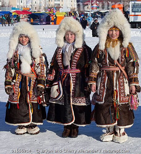 Nenets women competing in a traditional clothing competition during the reindeer herders' festival at Nadym. Yamal, Western Siberia, Russia People,Woman,Traditional,Few,Three,Group,Celebration Event,Occasion,Occasions,Festival,Russia,Siberia,Clothing,Traditional Clothing,Culture,Indigenous Culture,Russian Culture,Tribes,Siberian culture, Bryan and Cherry Alexander Inuit Clothing, Russian Coat, Inuit People, Nature Picture, Best Nature, Russian Culture, Leather Workshop, Fur Parka, Star Children