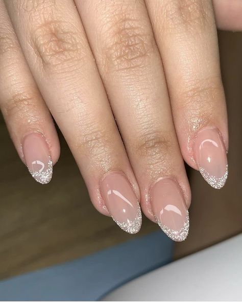 Hoco Nails French Tip Glitter, Simple Silver Glitter Nails, Oval Glitter Tip Nails, Nail Inspo Champagne, Sparky White Nails, Silver Sparkle Tips Nails, Nails For A Champagne Dress, White Glitter French Tip Nails Almond, Sparkle Tips Acrylic Nails