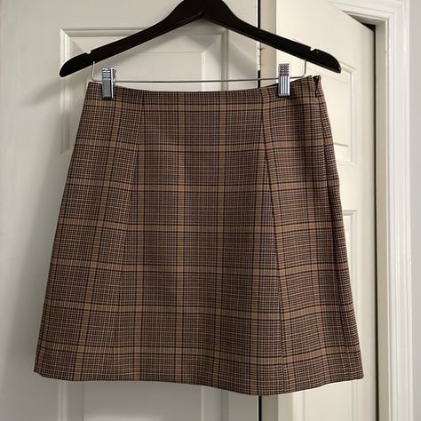 Babaton mini skirt, tan with brown plaid pattern, size 8. Brown Short Skirts, Brown Plaid Mini Skirt, Brown Checkered Skirt Outfit, Winx Faries, Brown Plaid Skirt Outfit, Plad Skirt, Plaid Skirt Brown, Mini Skirt Aesthetic, Gretchen Wieners