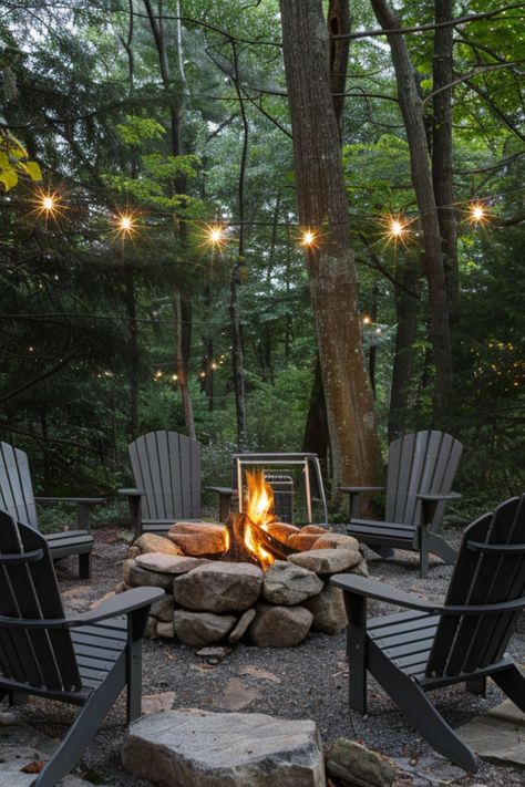 Get inspired with 40 unique backyard fire pit designs that fit any small yard. These simple, budget-conscious ideas include DIY options for both square and round pits, perfect for creating a cozy outdoor lounge space. Fire Pit Lakeside, Fire Pit In The Woods Ideas, Forest Lounge Ideas, Rustic Firepit Outdoor, Fire Pit Cottage, Fire Pit Cabin, Large Rock Fire Pit, Lake Fire Pit, Forest Fire Pit