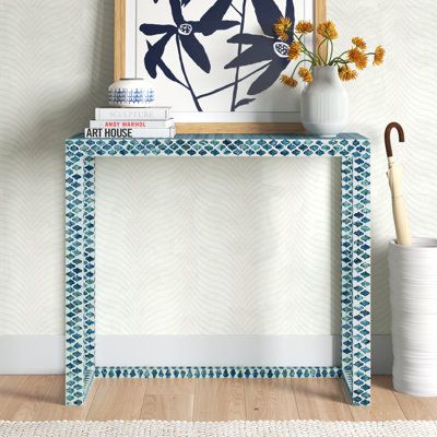 Greet guests in your entryway with this elegant and breezy console table. It showcases a beachy capiz shell inlay in soft, neutral hues for an artisanal vibe that's sure to complement your coastal space. The 35" wide frame is made from engineered wood, and it rests on a sled base for an open feel that keeps sightlines clear. We love that the surface accommodates everything from accent pieces and a vase of fresh flowers to a table lamp and a mail organizer. Plus, this table offers a lot of room u Living Room Side Table Decor Ideas, Console Table Modern Luxury, Console Table For Bedroom, Minimalist Entryway, Small Entryway Table, Entrance Console, Console Table Modern, White Console Table, Side Table Decor