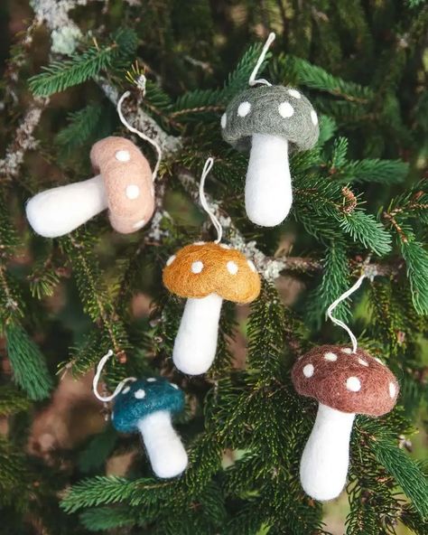 Needle felted wool mushroom ornaments. Felted mushroom ornaments. Felted Christmas ornaments. The CUTEST Mushroom Ornaments for Christmas. Christmas mushroom ornaments for a woodland Christmas tree theme. Lots of other mushroom ornament ideas - including cute DIY mushroom ornaments. Christmas mushrooms decoration; Christmas mushroom decor. Adorable Christmas mushroom ornaments. Woodland Christmas decor - woodland Christmas tree ideas. Mushroom Ornaments, Woodland Christmas Tree, Felt Mushroom, Needle Felted Christmas, Farmhouse Pottery, Christmas Hanging Decorations, Mushroom Decor, Woodland Christmas, Felt Christmas Ornaments