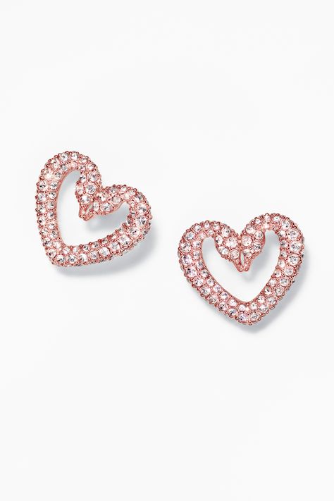 For the one you love. Say it with Swarovski Una.​ Formed in the shape of a heart, this rose gold-tone plated pair is designed to spark the imagination with dazzling pavé crystals. The perfect gift for a loved one – or yourself. Valentine's Day | Romantic | Heart | Gift Guide | Jewelry | Crystal | Must-have | Statement | Bold | Fashion Rock Rings, Swarovski Heart, Dance Necklace, Romantic Heart, Gold Jewellery Design Necklaces, Jewelry Design Necklace, Heart Gifts, Square Earrings, Swarovski Earrings