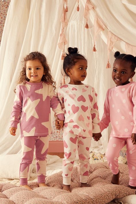 This 3-pack of pyjamas is the perfect way to stock up on their sleepwear essentials, crafted from pure cotton across long sleeve T-Shirts and full-length trousers, available in a choice of bold colours and prints. Machine washable. 3 x Pyjama Top and 3 x Pyjama Bottom 100% Cotton. Girls Pyjamas, Girls Nightwear, Floral Pajamas, Heart Flower, Swimwear Dress, Maxi Dress Wedding, Matching Pajamas, Cotton Pyjamas, Pajama Bottoms