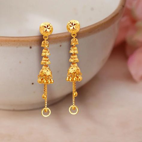 Get stylish long drop gold earrings from Kalyan Jewellers. Long drop gold earrings are available in stunning designs from Kalyan. Hanging Gold Earrings Design, Malabar Jewellery, Long Chain Earrings Gold, Dropping Earrings, Chain Earrings Gold, Drop Gold Earrings, Kalyan Jewellers, Temple Jewellery Earrings, Gold Jewellry