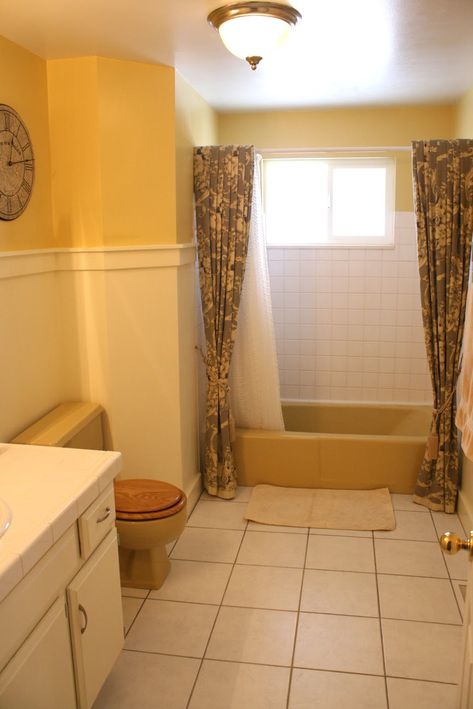 Mustard Yellow Tub and Toilet Updated Bathroom Yellow Tile Bathroom, Tub Bathroom Ideas, Yellow Bathroom Walls, Updated Bathroom, Brown Bathroom Ideas, Yellow Bathroom Decor, Brown Bathroom Decor, Bathroom Decor Colors, Yellow Bathroom