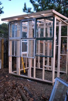 Okay, it's true, I have a special place in my heart for re-use projects and this in one of my favorite ideas that I have ever seen.  Check what Dori at Sparta Savings did with a whole bunch of old windows. Recycled Window Greenhouse by Sparta Savings     We had these studded wall … Chicken Coop With Concrete Floor, Backyard Shed Landscaping, Chicken Projects, Chick Brooder, Forgotten Chicken, Recycled Windows, Window Greenhouse, Garden Shed Ideas, Shed Landscaping