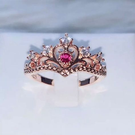 Size 8.5. Rose Gold Plated Princess Crown Style Ring. Faux Pink Sapphire Showcased At The Center Of The Crown With Clear Cz Crystals. Stamped 925 / 18k Gp. Rose Gold Plated Copper. Ring Box Not Included. Will Come In A Small Plastic Bag. This Item Is Brand New, An Unbranded Boutique Item. However, Please Note That It Does Not Come With Tags. Multiple Available I Include A Packing Slip That Includes Price In Shipping Orders. Please Let Me Know At Time Of Purchase If This Is A Gift And I Won’t Include Price. #Pretty #Cute #Trendy #Birthday #Christmas #Holiday #Valentine’s Day #Mother’s Day #Anniversary #Present #Gift #Love #Heart #Kiss #Engagement Ring #Wedding Ring #Flirty #Jewelr Pink Quince Ring, Purple Quince Ring, Quince Rings Gold, Quinceañera Rings, Quinceanera Rings, Quince Rings, Princess Crown Ring, Quinceanera Jewelry, Rose Gold Princess