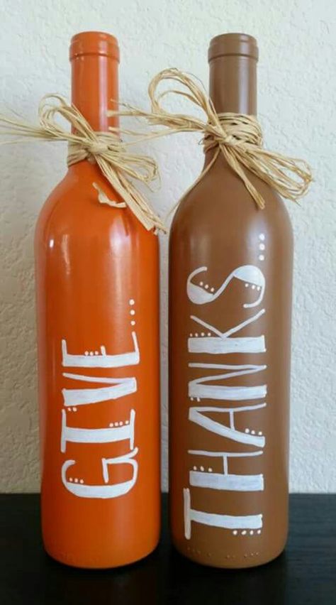 Easy and cute Thanksgiving decoration. Made with two wine bottles, brown, orange and white paint, and some twine. Fall Wine Bottles, Diy Thanksgiving, Wine Bottle Diy Crafts, Thanksgiving Diy, Wine Bottle Diy, Thanksgiving Table Decorations, Wine Bottle Decor, Craft Night, Wine Bottle Crafts