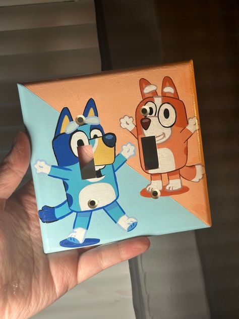 Got a kid who loves Bluey? This light switch cover is the perfect addition for any kids room, nursery, or a fun addition to the living space. Each item is hand painted and made to order. Space Light Switch Cover, Bluey Themed Bathroom, Bluey Room Decor Kids, Bluey Themed Room Ideas, Bluey Bathroom Ideas, Bluey Bedroom Ideas For Kids, Bluey Room Ideas For Boys, Bluey Painting, Toddler Room Ideas Girl