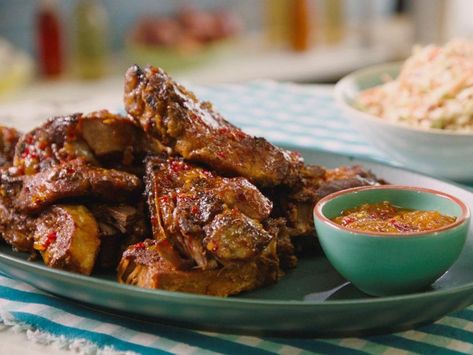 Slow Cooker Country Ribs with Peach Glaze Recipe | Jeff Mauro | Food Network Peach Glaze Recipe, Slow Cooker Country Ribs, Peach Glaze, Country Ribs, Ribs Recipes, Glazed Ribs, Jeff Mauro, The Kitchen Food Network, Crockpot Ribs