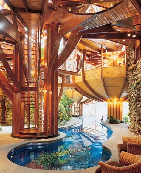 A 75-foot-long pool winds its way along the lower level of this house in Columbus, Ohio (580x712) - Imgur Cold Bedroom, Casa Fantasy, Spiral Staircases, Piscina Interior, Indoor Swimming Pool, Unusual Homes, Hiasan Bilik, Dream Pools, Organic Architecture