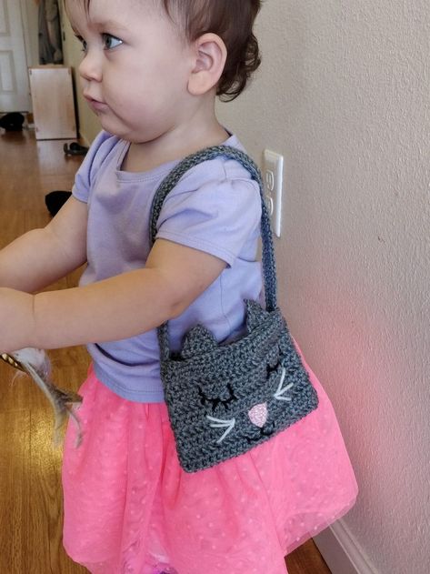 THE PURR-FECT PURSE FOR TODDLERS CROCHET PATTERN - Ariana Hall | Toddler crochet patterns, Crochet toddler, Diy crochet purse Toddler Crochet Patterns, Purse Patterns Free, Toddler Purse, Crochet Purse Pattern Free, Kids Purse, Crochet Toddler, Bag Pattern Free, Crochet Girls, Crochet Purse