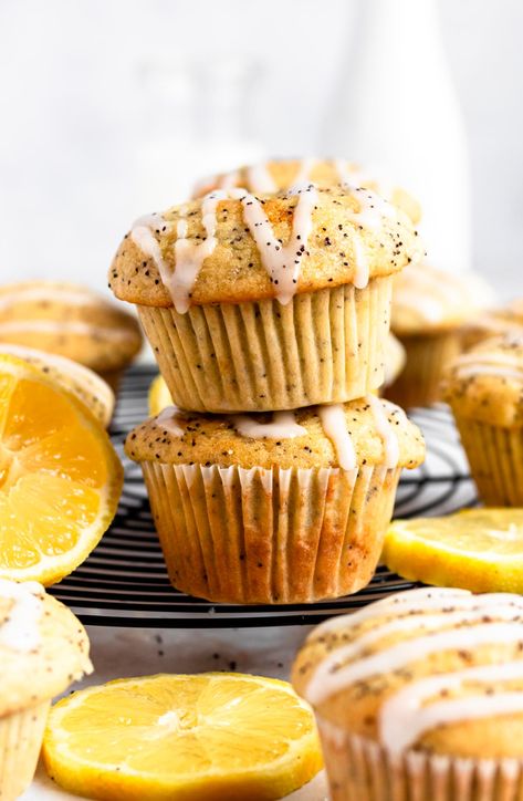 Stack of two lemon poppyseed muffins on a cooling rack. Lemon Muffin Recipes, Triple Chocolate Muffins, Poppyseed Muffins, Lemon Poppy Seed Muffins, Dairy Free Brownies, Lemon Ricotta Pancakes, Seed Muffins, Moist Muffins, Easy Carrot Cake