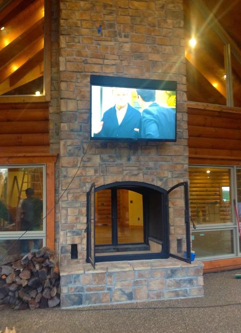 This See Through Wood Burning Indoor Outdoor Fireplace was custom designed for a log home being built in Indiana. See the project unfold here! Farmhouse Fireplace Screens, Indoor Wood Burning Fireplace, Indoor Outdoor Fireplace, Outdoor Wood Burning Fireplace, Fireplace Patio, Indoor Outdoor Fireplaces, Adirondack Furniture, Woodworking Projects Furniture, Double Sided Fireplace