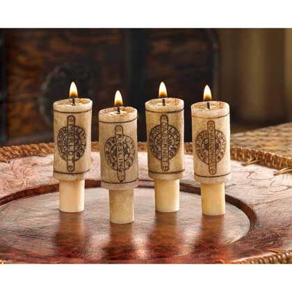 #14374 Wine Cork Candle Set  Recreate the romance of your favorite wine bistro! Whimsical wine cork candles fit into the neck of your empty bottles, creating a refined display that will delight any gourmet; lifelike wine fragrance adds a luscious touch. Each candle burns up to 4 hours.  Item Weight: 0.2 lb. Set of 4  Each is 1" diameter x 3" high.  Paraffin wax. $7.95 Wine Cork Candle, Cork Candle, Wine Bottle Cork, Wine Wedding Favors, Novelty Candles, Empty Wine Bottles, Gel Candles, Candle Wedding Centerpieces, Bulk Candles