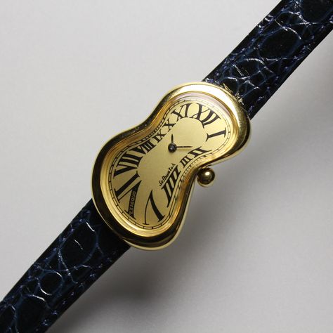 Salvador dali museum watch from 1990s 1990s salvador dali softwatch come original melting buckle " The Disintegration of the persistence of memory " Authentic designed from Salvador Dali museum     💛Gold case / champagne dial 🖤Roman international markers 🤍Celluloid crystal scratched 💛original melting buckle 🖤genuine leather strap cracked ✅Fine Working conditions Authentic from salvador dali museum Good conditions Dimension Case 🔽 High 38mm x width 24 mm Conditions 90% Because it is a watch Salvador Dali Watch, Dali Watch, The Persistence Of Memory, Salvador Dali Museum, Dali Museum, Girly Accessories, Salvador Dali, Future Fashion, Gold Case