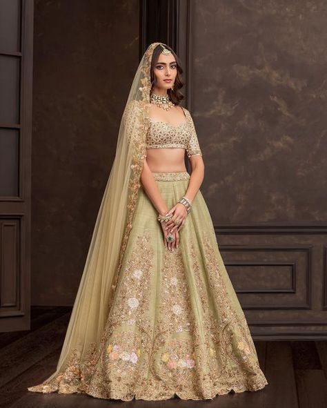 Shyamal & Bhumika on Instagram: "A jade-green panelled lehenga, with intricate gold and contrast thread embroidery. . Wedding Couture Shyamal & Bhumika . Kindly WhatsApp us on +91 9833520520 for more information." Shyamal And Bhumika, Wedding Couture, Embroidery Wedding, Green Lehenga, Indian Couture, Thread Embroidery, Jade Green, More Information, Lehenga