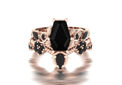 *********** WELCOME TO ADM JEWELRY ************* This stunning Vintage Coffin Shaped Black Onyx Wedding Ring Set is the perfect choice for anyone who loves gothic and vintage-inspired jewelry. Made with high-quality materials and exquisite attention to detail, this handmade ring set features a unique coffin-shaped black onyx stone, set in rose gold for a beautiful contrast. DESIGNED BY SELF RING TYPE - ENGAGEMENT RING,PROMISE RING,BRIDAL RING,SOLITAIRE RING,WEDDING "HANDMADE WITH LOVE" Onyx Rings, Black Onyx Engagement Ring, Black Wedding Band, Vintage Inspired Jewelry, Black Onyx Stone, Ring Art Deco, Black Onyx Ring, Anniversary Gifts For Wife, Rings Set