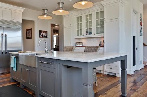 Gorgeous white and gray kitchen with shaker, perimeter cabinets painted Sherwin Williams Pearly White accented with polished nickel hardware and a subway tiled backsplash. Milk Paint Cabinets, Milk Paint Kitchen Cabinets, Kitchen Island Finishes, Paint Kitchen Cabinets, Grey Kitchen Island, Серая Кухня, Bar Cabinets, House Of Turquoise, Paint Kitchen