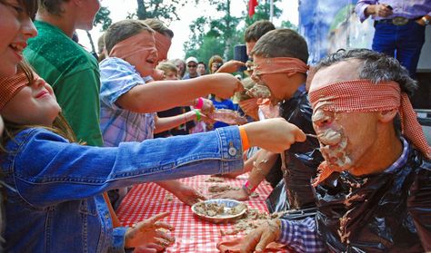 Pie-eating contest at the 104th Annual Priddis & Millarville Fair. A blind eater, blind feeder and a third to give instructions makes for a messy day. Pie Eating Contest Funny, Eating Competition Games, Pie Eating Contest Ideas, Eating Contest Ideas, Pie Face Game, Messy Games, Backyard Party Games, Pie Eating Contest, Fall Carnival