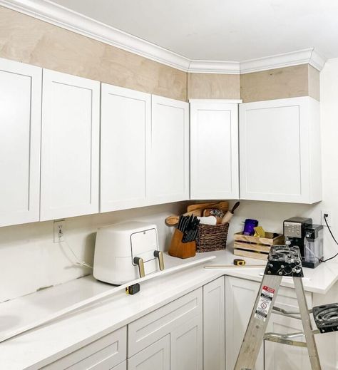 How to Extend Cabinets To The Ceiling on a BudgetExtend your standard height cabinets to the ceiling for this high end look without breaking the bankI am just a girl standing in front of her kitchen cabinets asking them to go all the way to the ceiling… Check out the complete tutorial with links here! Yes, I was asked when we were designing How To Make Cabinets Go To The Ceiling, Extend Cabinets To Ceiling Diy, Cabinet To Ceiling, Extending Kitchen Cabinets To Ceiling, Ceiling On A Budget, Kitchen Cabinets To The Ceiling, Cabinets To The Ceiling, Kitchen Cabinets To Ceiling, Cabinets To Ceiling