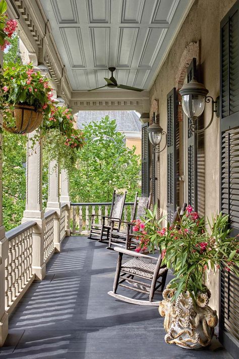 The upper porch of John O. Morisano and Carol A. Sawdye’s 1882 Italianate townhouse in Savannah, Georgia, which was designed by Chuck Chewning. Balcony Decorating Ideas, Dark Brown Walls, Brown Doors, Apartment Balcony, Brown Walls, Apartment Balcony Decorating, Savannah Georgia, Apartment Balconies, Small Patio