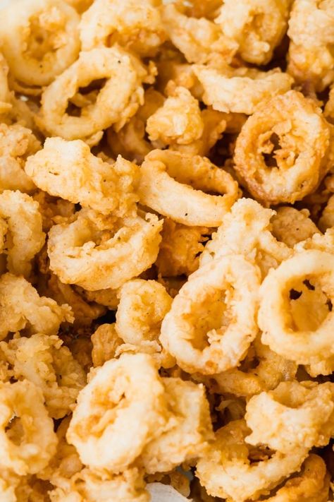 Better than a restaurant Calamari Fritti rings lightly dusted and pan-fried to crispy golden perfection. Served alongside a Peri-Peri Yogurt Dip. Perfect for a big ole fish fry or at home appetizer! #calamarirecipes #calamari #calamarirecipesfried #calamarifritti #calamarifrittirecipes #easterrecipes #seafoodrecipes #friedfishrecipes #easyappetizers Italian Calamari Recipes, Fried Calamari Recipe Easy, Cooking Squid, Cooking Calamari, Calamari Rings, Calamari Recipe, Seafood Sushi, Chowder Recipes Seafood, Calamari Recipes