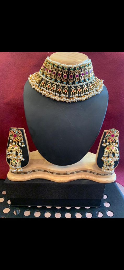 Beautifully crafted golden bridal chokerset in Hyderabadi jadau and white pearls. Set includes traditional Hyderabadi choker and earrings in double layer jhumki style. Nose ring can be added. Additional items can also be made like bangles, hathphool, rings, rani haar, passa etc. It can be customized in any available color choice i.e. gold or silver and pearls can be replaced with colorful beads and stones. WhatsApp for details +919166895146 or follow on Instagram @theelitefashionofficial. Rani Haar, Follow On Instagram, Wedding Jewellery, Bridal Jewellery, Festival Captain Hat, Pearl White, Double Layer, Bridal Jewelry, Wedding Jewelry