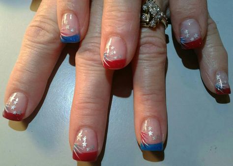 Fourth of July nail design! Acrylic French tips with stamped stars and hand painted fireworks with gel top coat French Tip Nails With 4th Of July Design, Forth Of July Nails French Tips, French Fourth Of July Nails, Luminary Nails Design 4th Of July, 4thnof July Nails, Fourth Of July Nails, Gel Top Coat, French Tip Acrylic Nails, July Nails