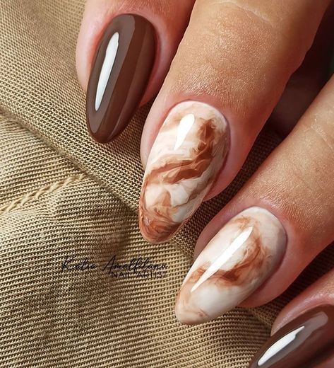 Immerse yourself in the fall vibes with elegant nail designs that convey the enchantment of the season. Embellish your nails in style. Nail Art On Brown Nails, Brown Nail Arts, Acrylic Brown Nail Designs, Simple Earthy Nail Designs, Nail Art For Dark Hands, Best Autumn Nails, Brown Fall Nails 2022, Brown Nails With White Design, Fall Manicure Designs