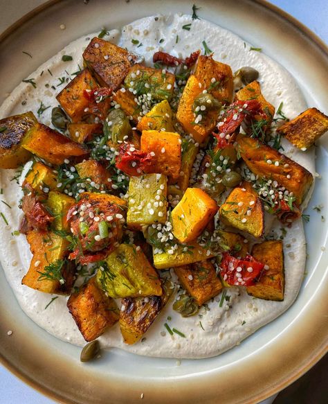 If you’re tired of the same pumpkin recipes and craving something savory, I have just the thing for you: Roasted Pumpkin Over Creamy Tofu. Thanksgiving Tofu Dishes, Tofu Squash Recipe, Holiday Tofu Recipes, Vegan Thanksgiving Tofu, Tofu Thanksgiving, Tofu Roast, Roasted Pumpkin Recipes, Tofu Cream, Veggie Mains