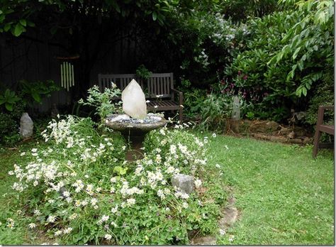 Ten Rockin’ Ways to Use Crystals Outside Your Home Crystals In Garden, Crystal Garden Outdoor, Outdoor Crystal Garden, Mineral Tub Garden, Crystals Garden, Mystical White Crystals For Meditation, Woodland Garland, Crystal Gardens, Moonlight Garden