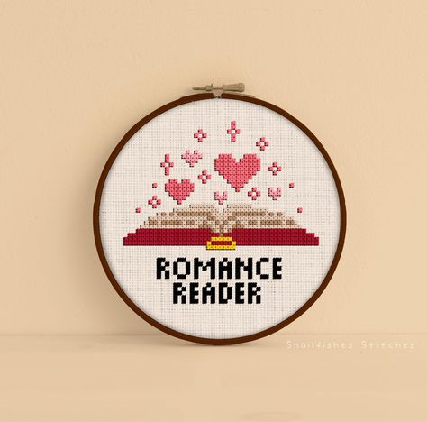 Cozy up with a good audio book and this bookish romance cross stitch pattern!    This is a DIGITAL DOWNLOAD for a PATTERN ONLY!   There is no physical item with this listing- the image shown is meant as a color example only. You will only receive a digital copy of the shown pattern. The example is a digital mockup.  This listing includes a colored pattern with symbols, a black and white symbol only pattern, and a thread guide in .PDF format. If you need a format other than .PDF, please contact m Bookish Cross Stitch Patterns, Reading Cross Stitch, Bookish Cross Stitch, Teacher Cross Stitch, Book Cross Stitch, Books Cross Stitch, Cross Stitch Cute, Geek Cross Stitch, White Symbol