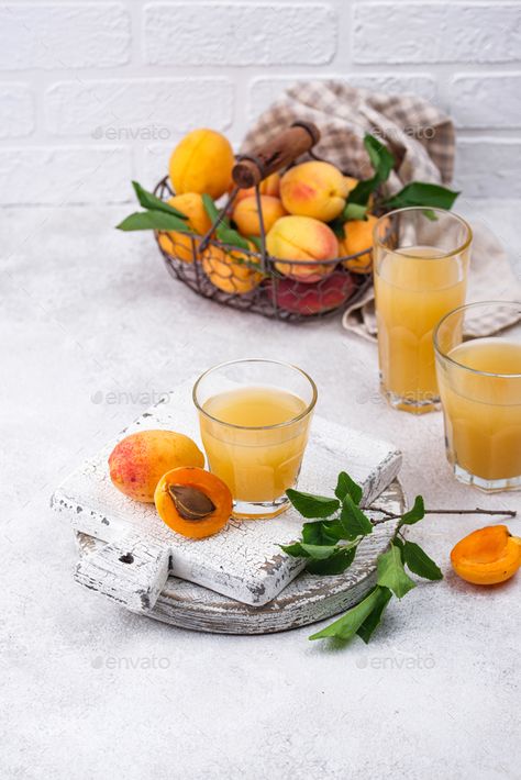 Apricot juice in glass. Healthy drink by furmanphoto. Apricot juice in glass. Healthy vitamin summer drink #Sponsored #glass, #Healthy, #Apricot, #juice Apricot Juice, Corporate Logos Inspiration, Glass Aesthetic, Corporate Logos, Peach Juice, Healthy Drink, Logos Inspiration, Summer Drink, Summer Drinks