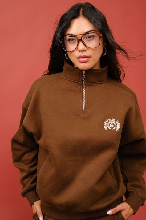 Stay cozy and stylish with the Soft Terry Quarter Zip Sweatshirt. Made from a blend of 58% polyester and 42% cotton, this sweatshirt features an ultra-soft fleece lining for warmth and comfort. The quarter-zip design adds versatility, while the detailed embroidery and kangaroo pocket bring a unique, casual touch. Perfect for layering or wearing on its own, this sweatshirt is ideal for chilly days and laid-back looks. Key Features: Soft fleece lining for added warmth and comfort Quarter zip design for versatility Embroidery detail for a stylish finish Kangaroo pocket for functionality and style Made from 58% polyester and 42% cotton for durability Detailed Embroidery, Zip Design, Cashmere Dress, Quarter Zip Sweatshirt, Stay Cozy, Embroidery Details, Zip Sweatshirt, Kangaroo Pocket, Stay Warm