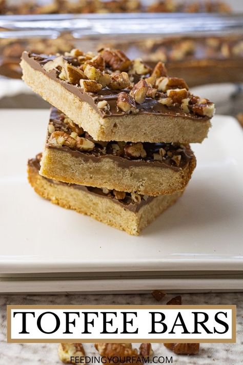 If you love the flavors of Homemade Toffee, then you will love the taste of this simple recipe for Toffee Bars. Toffee Bars have a delicious shortbread, crunchy crust topped with milk chocolate and chopped pecans. This recipe is super simple to make and makes a big batch, perfect for sharing or taking along to a potluck. Toffee Squares Recipe, Toffee Shortbread Bars, Mini Cookie Recipe, Easy Squares, Chocolate Pretzel Bars, Toffee Bars Recipe, Toffee Bar, Toffee Squares, Shortbread Bars Recipes