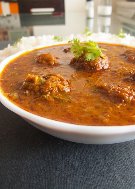 Lauki Kofta Curry Recipe is a North Indian Curry Recipe made of shredded bottle gourd and goes well with jeera rice or plain rice.  https://thetastesofindia.com/lauki-kofta-curry-recipe/ Pani Poori, Lauki Kofta, India Recipes, Kofta Curry Recipe, Pakistan Food, Kofta Curry, Plain Rice, Jeera Rice, Bottle Gourd