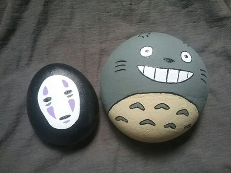 I painted some Studio Ghibli themed rocks. Stone Art Aesthetic, Rock Painting Ideas Studio Ghibli, Studio Ghibli Painted Rocks, Rock Paintings Aesthetic, Studio Ghibli Rock Painting, Anime Rock Painting Ideas, Studio Ghibli Activities, Aesthetic Stone Painting, Anime Rock Painting