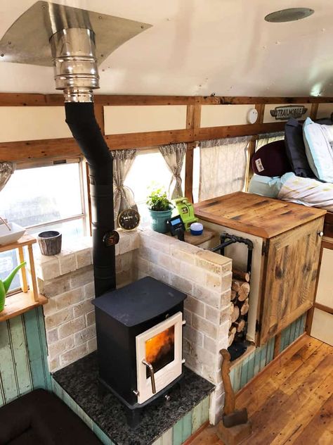 The Mobile Wood Stove: Heating our Bus Conversion | Wild Drive Life Rv Wood Stove, Tiny House Wood Stove, Mini Wood Stove, Tiny Wood Stove, School Bus Tiny House, School Bus Camper, Diy Wood Stove, Bus Living, School Bus Conversion