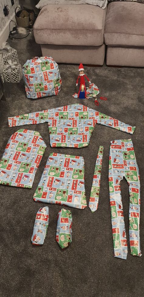 Elf On The Shelf Wrapping Presents, Elf On The Shelf Ideas Wrapping Paper, Elf Wrapping Paper Ideas, Elf On The Shelf Wrapping Paper, Elf Ideas, Present Wrapping, Shelf Ideas, On The Shelf, Christmas Elf