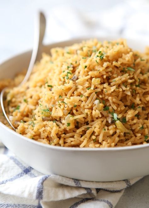 This classic rice pilaf recipe makes a great side dish! Thanks to my days in culinary school, I'm proud to say that rice is one of my specialties. We always made a rice pilaf to Rice Pilaf With Vermicelli, Best Rice Pilaf, Vegetable Rice Pilaf, Easy Rice Pilaf, Caribbean Rice, Homemade Turkey Gravy, Caribbean Foods, Completely Delicious, Rice Pilaf Recipe