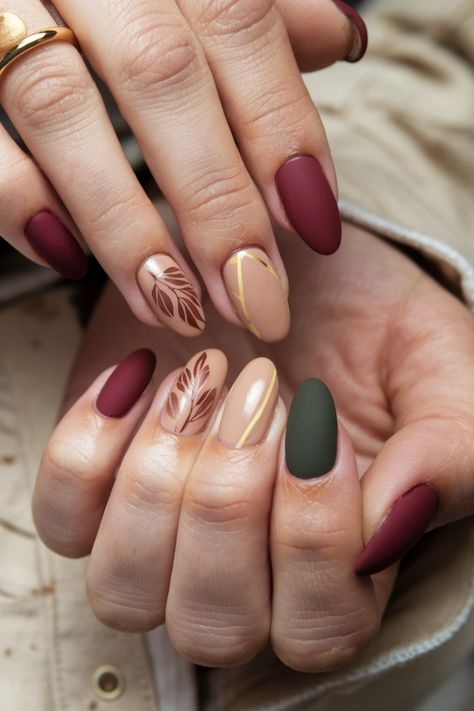 Embrace the season with these charming fall nail ideas designed for your natural nails. Picture warm, earthy tones like deep burgundy and mustard yellow, creatively swirled together for a cozy aesthetic. Add a hint of delicate gold sparkles to elevate your look, capturing the essence of autumn leaves. This style is perfect for anyone who wants a subtle yet striking way to celebrate the season. Get inspired and bring autumn to your fingertips! Fall Almond Nails Ideas Green, Nails Ideas Green, Fall Almond Nails Ideas, Almond Nails Ideas, Fall Almond Nails, Nails Unique, Fall Nail Ideas, Unique Fall, Cozy Aesthetic