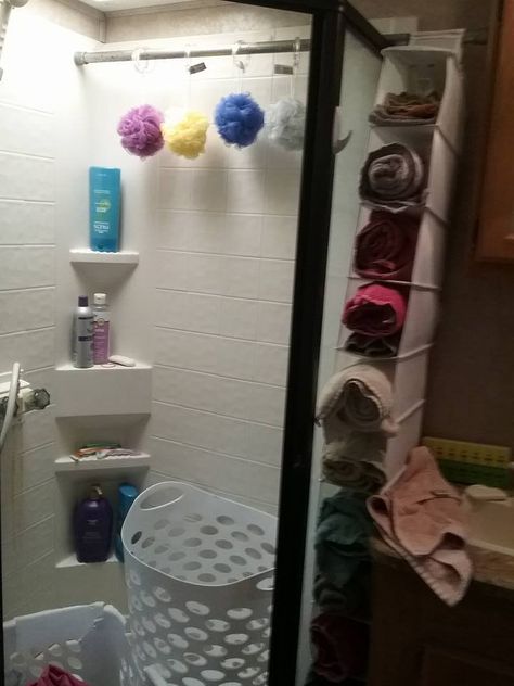 RV Bathroom Storage & Organization Ideas | RV Inspiration Rangement Caravaning, Rv Living Organization, Rv Storage Organization, Travel Trailer Organization, Rv Storage Ideas, Trailer Organization, Rv Bathroom, Camper Hacks, Camper Organization