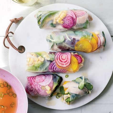 When the summer markets are full of great ingredients like corn, basil and sunflower sprouts,Food & Wine's Justin Chapple makes his fresh and colorful summer rolls. Summer Rolls Recipe, Rice Paper Wrappers, Turmeric Recipes, Grilled Tofu, Summer Rolls, White Plate, Spring Rolls, Rolls Recipe, Rice Paper