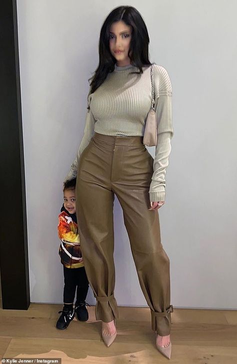 Photobomber: The 22-year-old also took to her story with an outtake, showing Stormi smiling while hiding behind her leg Kylie Jenner Outfits Casual, Kylie Jenner Street Style, Ropa Kylie Jenner, Stile Kylie Jenner, Mode Adidas, Look Kylie Jenner, Looks Kylie Jenner, Trajes Kylie Jenner, Mode Kylie Jenner