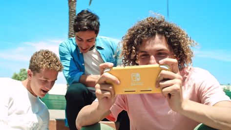 Nintendo Switch Lite won't be VR compatible (or good for Labo) Playing Switch Pose, Playing Nintendo Switch Pose, Playing Nintendo Switch, Nintendo Handheld, Headphone Wrap, Vr Goggles, Portable Console, Nintendo Switch Lite, Usa Bag