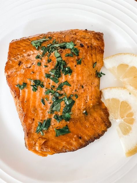 A close of up of the Easy Pan Seared Steelhead Trout with Lemon Butter Sauce with seasonings Pan Seared Steelhead Trout, Seared Trout Recipes, Steelhead Trout Recipe Pan Fried, Trout Seasoning, Pan Fry Trout Recipe, Steel Head Trout Recipes, Trout Fillet Recipes, Pan Fried Trout, Frying Pan Recipes